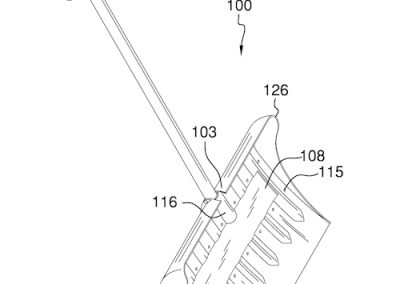 Shovel with living hinge